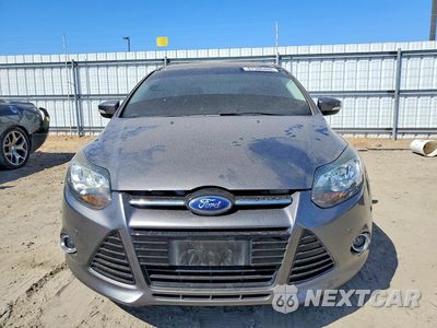 Piąte zdjęcie samochodu w środku: 2013 FORD FOCUS TITANIUM VIN:1FADP3N25DL307991 - miniatura