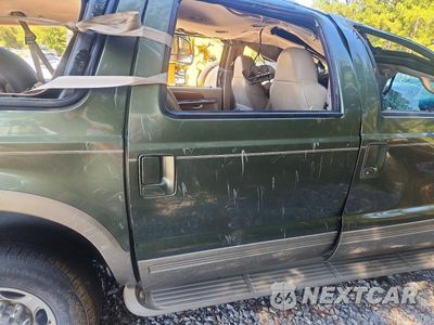 Zdjęcie 10 z 12 samochodu: 2000 FORD EXCURSION LIMITED VIN:1FMNU43S5YED53598 - miniatura