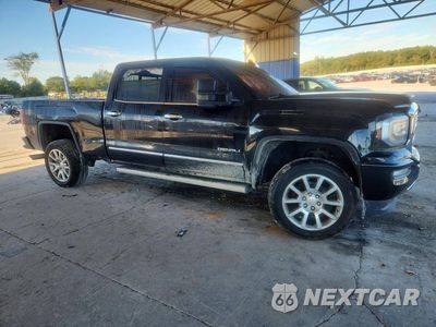 Czwarte zdjęcie samochodu z boku: 2017 GMC SIERRA K1500 DENALI VIN:3GTU2PEJ9HG415556 - miniatura