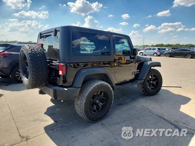 Trzecie zdjęcie samochodu z tyłu: 2016 JEEP WRANGLER SPORT VIN:1C4AJWAG9GL339655 - miniatura