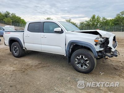 Czwarte zdjęcie samochodu z boku: 2016 TOYOTA TACOMA TRD OFF-ROAD VIN:3TMCZ5AN2GM042610 - miniatura