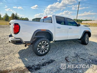 Trzecie zdjęcie samochodu z tyłu: 2023 GMC CANYON DENALI VIN:1GTP6FEK7P1195822 - miniatura