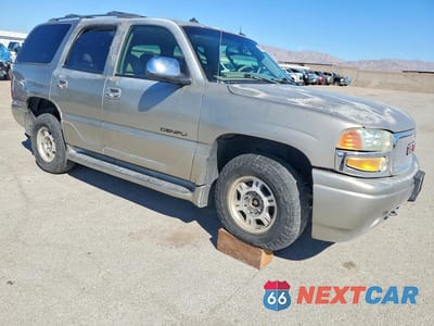 Czwarte zdjęcie samochodu z boku: 2003 GMC YUKON DENALI VIN:1GKEK63U73J172336 - miniatura