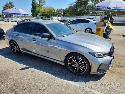 Czwarte zdjęcie samochodu z boku: 2023 BMW 330E VIN:3MW39FF00P8D05590 - miniatura