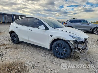Czwarte zdjęcie samochodu z boku: 2021 TESLA MODEL Y VIN:5YJYGDEE2MF213145 - miniatura
