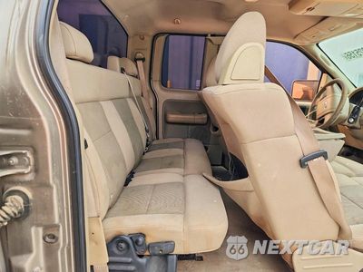 Zdjęcie 10 z 12 samochodu: 2005 FORD F150 VIN:1FTRX12W55FA32294 - miniatura