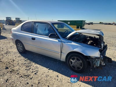 Czwarte zdjęcie samochodu z boku: 2003 HYUNDAI ACCENT GL VIN:KMHCG35C63U276298 - miniatura