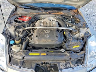 Zdjęcie 11 z 12 samochodu: 2004 NISSAN 350Z ROADSTER VIN:JN1AZ36A04T015858 - miniatura