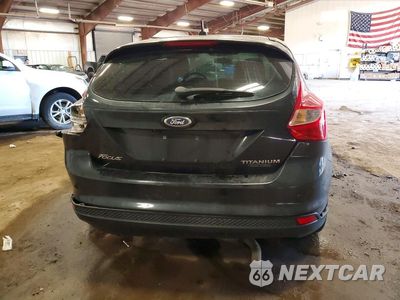 Zdjęcie 6 z 12 samochodu: 2014 FORD FOCUS TITANIUM VIN:1FADP3N22EL258900 - miniatura
