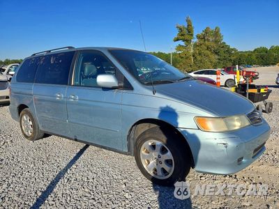 Czwarte zdjęcie samochodu z boku: 2004 HONDA ODYSSEY EXL VIN:5FNRL18054B036007 - miniatura