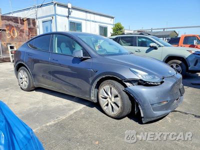 Czwarte zdjęcie samochodu z boku: 2023 TESLA MODEL Y VIN:7SAYGDEEXPA151711 - miniatura