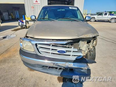 Piąte zdjęcie samochodu w środku: 1999 FORD F150 VIN:1FTZX1722XNB99078 - miniatura