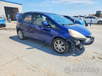 Czwarte zdjęcie samochodu z boku: 2011 HONDA FIT SPORT VIN:JHMGE8H59BC013747 - miniatura