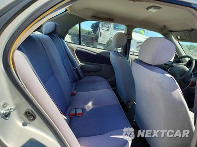 Zdjęcie 10 z 12 samochodu: 1999 TOYOTA COROLLA VE VIN:1NXBR12E7XZ296369 - miniatura