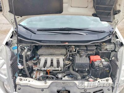 Zdjęcie 11 z 13 samochodu: 2011 HONDA FIT VIN:JHMGE8H32BS009625 - miniatura