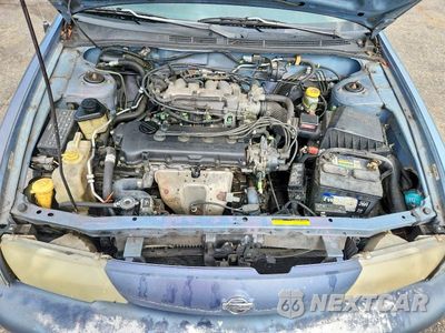 Zdjęcie 11 z 12 samochodu: 1999 NISSAN SENTRA XE VIN:1N4AB41D6XC706850 - miniatura