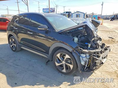 Czwarte zdjęcie samochodu z boku: 2017 HYUNDAI TUCSON LIMITED VIN:KM8J33A26HU292010 - miniatura