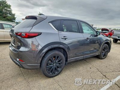 Trzecie zdjęcie samochodu z tyłu: 2022 MAZDA CX-5 SIGNATURE VIN:JM3KFBXYXN0648670 - miniatura