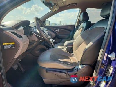 Zdjęcie 7 z 13 samochodu: 2012 HYUNDAI TUCSON GLS VIN:KM8JU3AC5CU340031 - miniatura