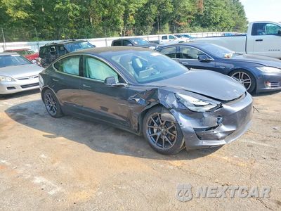 Czwarte zdjęcie samochodu z boku: 2018 TESLA MODEL 3 VIN:5YJ3E1EB3JF089709 - miniatura