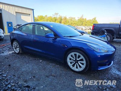 Czwarte zdjęcie samochodu z boku: 2022 TESLA MODEL 3 VIN:5YJ3E1EA5NF368933 - miniatura