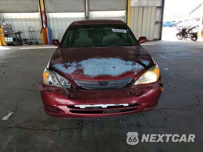 Piąte zdjęcie samochodu w środku: 2002 TOYOTA CAMRY LE VIN:4T1BE30KX2U573329 - miniatura
