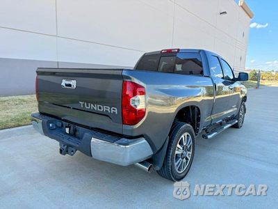 Czwarte zdjęcie samochodu z boku: 2014 TOYOTA TUNDRA SR5 VIN:5TFRM5F1XEX073304 - miniatura