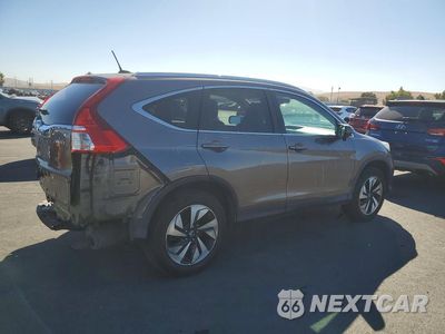 Trzecie zdjęcie samochodu z tyłu: 2016 HONDA CR-V TOURING VIN:5J6RM4H95GL015232 - miniatura