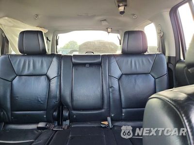 Zdjęcie 10 z 13 samochodu: 2014 HONDA PILOT EXLN VIN:5FNYF4H70EB042588 - miniatura