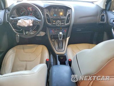 Zdjęcie 8 z 12 samochodu: 2016 FORD FOCUS TITANIUM VIN:1FADP3J28GL287763 - miniatura