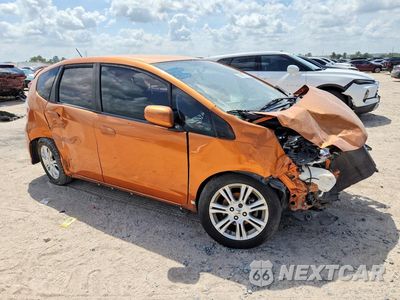 Czwarte zdjęcie samochodu z boku: 2010 HONDA FIT SPORT VIN:JHMGE8H40AS011011 - miniatura