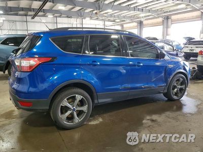Trzecie zdjęcie samochodu z tyłu: 2017 FORD ESCAPE SE VIN:1FMCU9G9XHUA70714 - miniatura