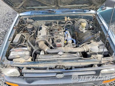 Zdjęcie 11 z 12 samochodu: 1994 TOYOTA PICKUP BASE VIN:4TARN81A4RZ242759 - miniatura