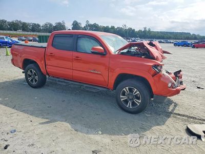 Czwarte zdjęcie samochodu z boku: 2016 TOYOTA TACOMA TRD SPORT VIN:5TFCZ5ANXGX039013 - miniatura