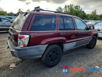 Trzecie zdjęcie samochodu z tyłu: 1999 JEEP GRAND CHEROKEE LAREDO VIN:1J4GW58S7XC678876 - miniatura