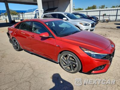 Czwarte zdjęcie samochodu z boku: 2022 HYUNDAI ELANTRA N LINE VIN:KMHLR4AF1NU277572 - miniatura