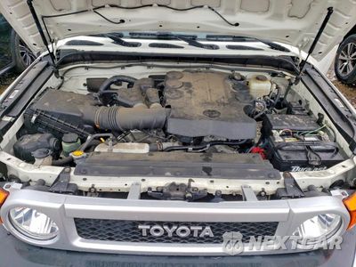 Zdjęcie 11 z 12 samochodu: 2014 TOYOTA FJ CRUISER BASE VIN:JTEBU4BFXEK193304 - miniatura