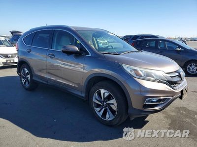 Czwarte zdjęcie samochodu z boku: 2016 HONDA CR-V TOURING VIN:5J6RM4H95GL015232 - miniatura