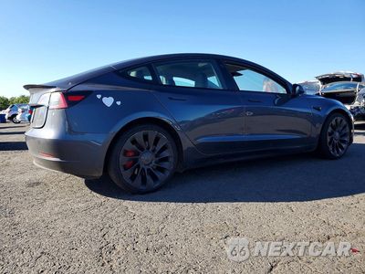 Trzecie zdjęcie samochodu z tyłu: 2023 TESLA MODEL 3 VIN:5YJ3E1EC9PF622700 - miniatura