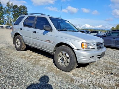 Czwarte zdjęcie samochodu z boku: 2001 HONDA PASSPORT EX VIN:4S6DM58W514408583 - miniatura