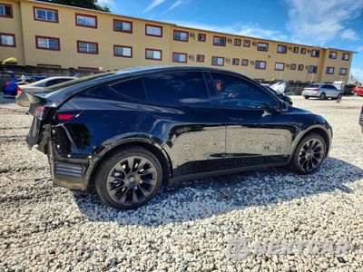 Trzecie zdjęcie samochodu z tyłu: 2024 TESLA MODEL Y VIN:7SAYGDED3RF092465 - miniatura