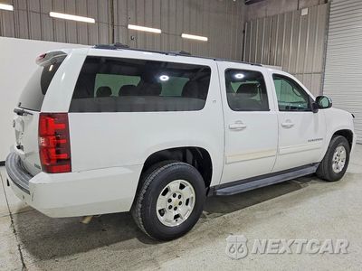 Trzecie zdjęcie samochodu z tyłu: 2012 CHEVROLET SUBURBAN C1500 LT VIN:1GNSCJE09CR127772 - miniatura