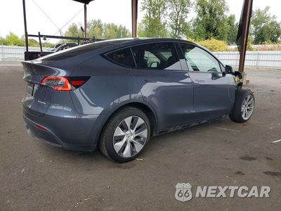 Trzecie zdjęcie samochodu z tyłu: 2023 TESLA MODEL Y VIN:7SAYGDEE2PF832514 - miniatura