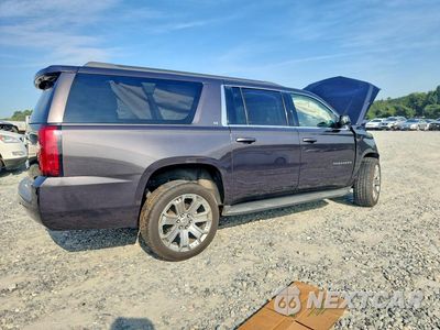Trzecie zdjęcie samochodu z tyłu: 2017 CHEVROLET SUBURBAN C1500 LT VIN:1GNSCHKC8HR136364 - miniatura