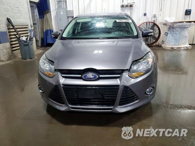 Piąte zdjęcie samochodu w środku: 2014 FORD FOCUS TITANIUM VIN:1FADP3N24EL399192 - miniatura