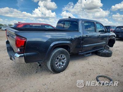 Trzecie zdjęcie samochodu z tyłu: 2019 TOYOTA TACOMA SR5 V6 VIN:3TMBZ5DN6KM022571 - miniatura