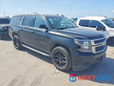 Czwarte zdjęcie samochodu z boku: 2015 CHEVROLET SUBURBAN C1500 LT VIN:1GNSCJKCXFR709768 - miniatura
