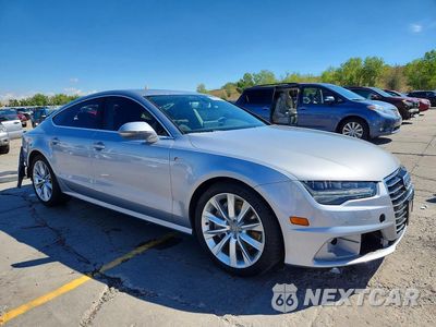 Czwarte zdjęcie samochodu z boku: 2016 AUDI A7 PREMIUM PLUS VIN:WAUWGAFC6GN003556 - miniatura