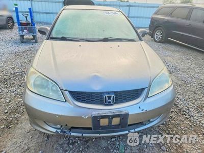 Piąte zdjęcie samochodu w środku: 2004 HONDA CIVIC LX VIN:1HGEM225X4L009177 - miniatura