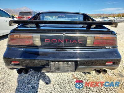Zdjęcie 6 z 12 samochodu: 1988 PONTIAC FIERO GT VIN:1G2PG119XJP200412 - miniatura